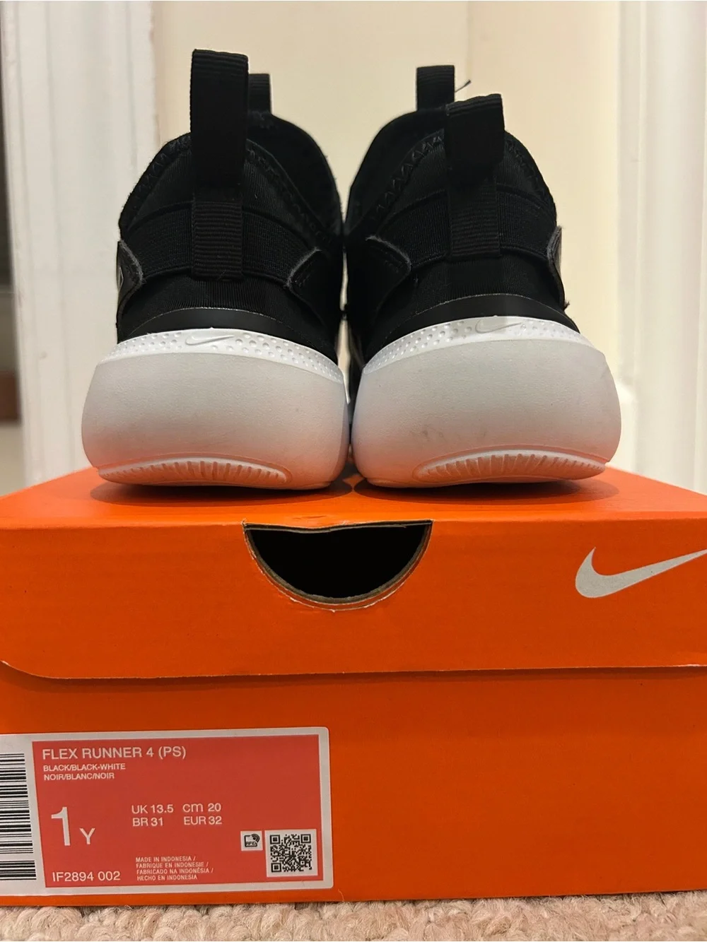 Kids Nike Black and White Slip-Ons